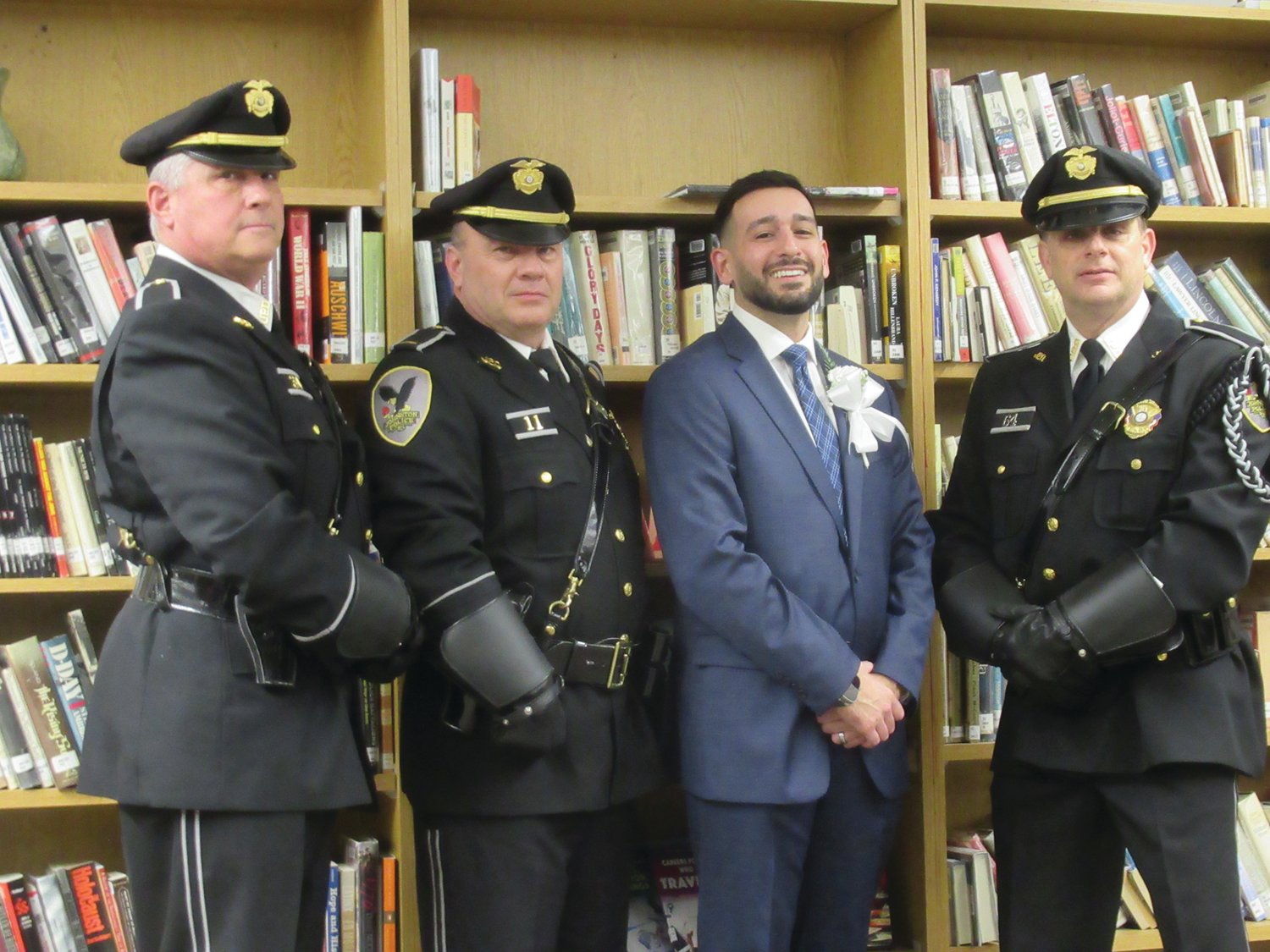 GRAND GUARD: Mayor Joseph Polisena Jr. is joined by the Johnston Police Color Guard that added color and pageantry to Monday’s inauguration. The officers are Detective David Slinko, Lt. Steve Guilmette and Patrolman Charles Psilopoulos.